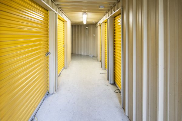 Devon Self Storage - 9219 - PINEHURST - 32777 Texas 249